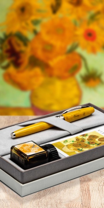 Van Gogh Sunflowers Visconti pen set with painting in the background